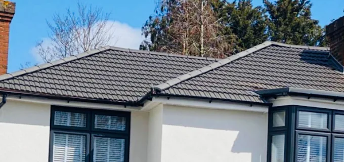 Grey slate roof on a bungalow with dormer