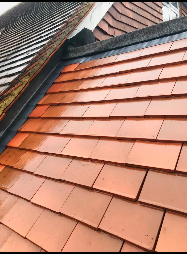 Fresh clay tiles with clean lead ridge detail