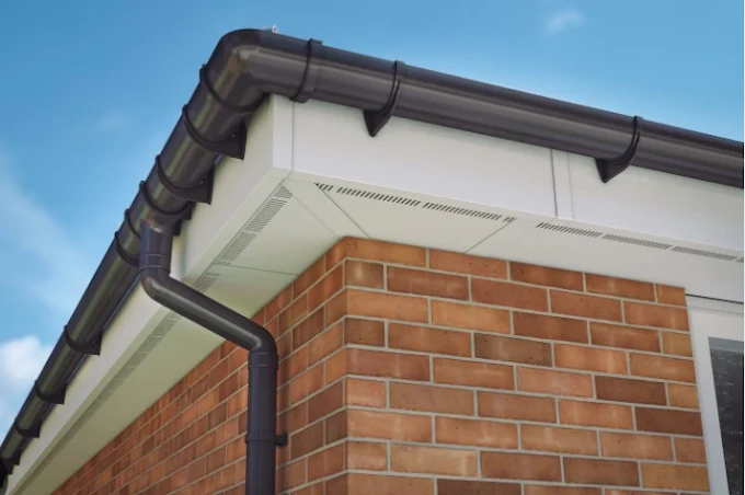 Grey slate roof with clean soffit and fascia line